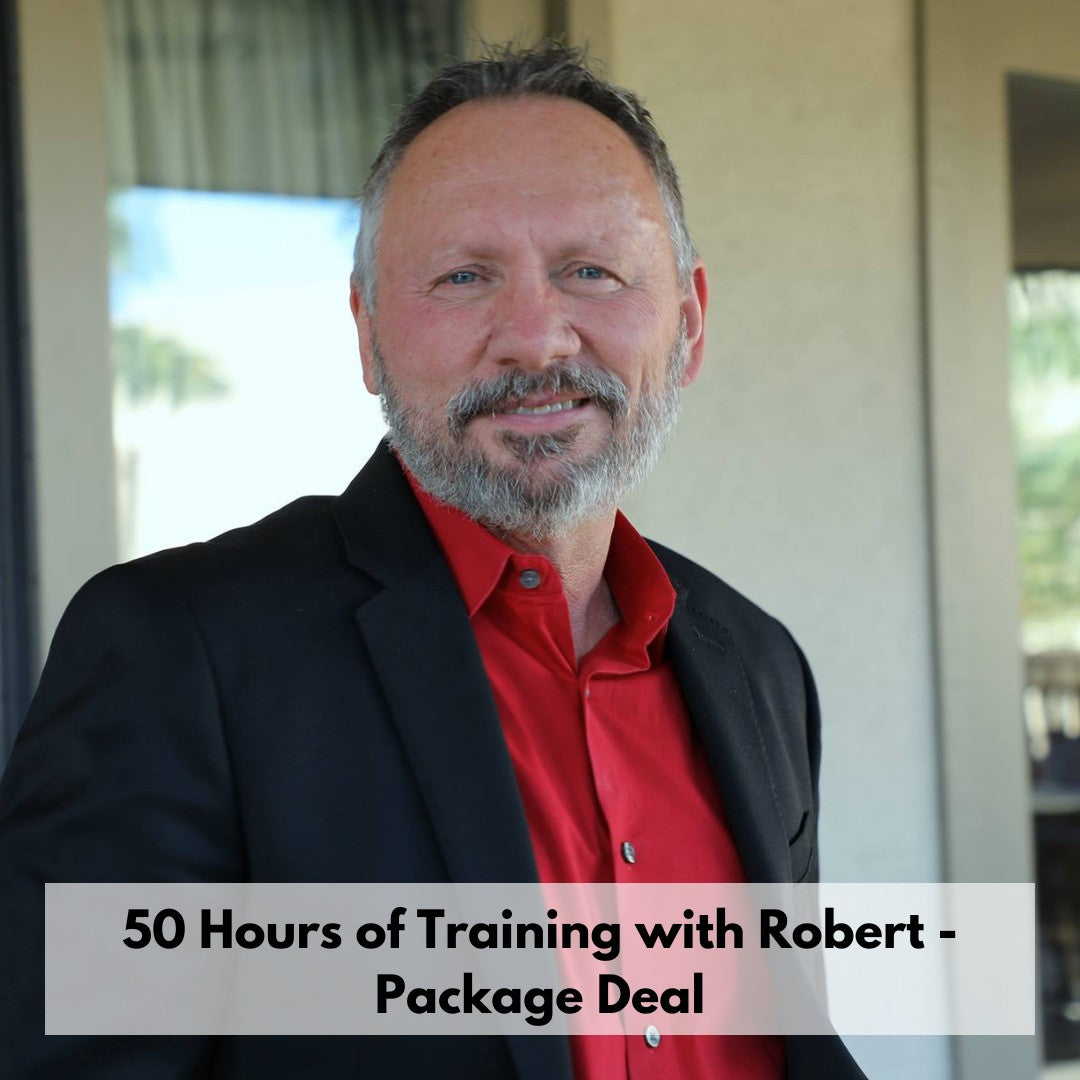 A bearded man in a red polo shirt stands outside, exuding a professional demeanor in a corporate setting.