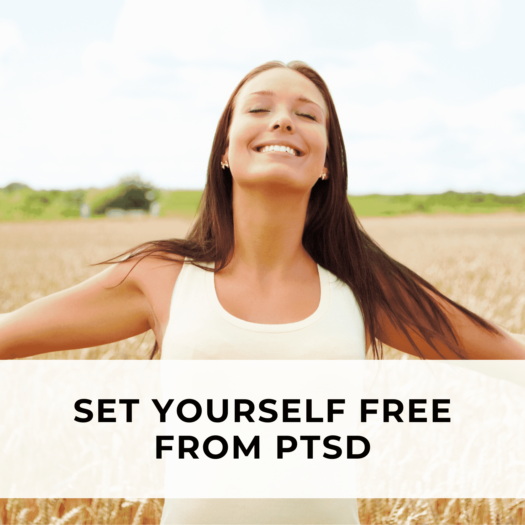 A woman stands in a serene field with her arms outstretched, embracing the open space and feeling a sense of freedom and release from PTSD.